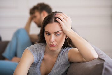 Young woman sit looking sad after a bad talk with her husband