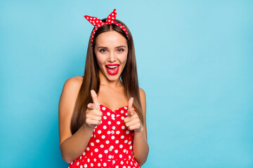 Close-up portrait of her she nice-looking attractive lovely cute cheerful cheery straight-haired girl pointing at you flirting inviting isolated over bright vivid shine vibrant blue color background