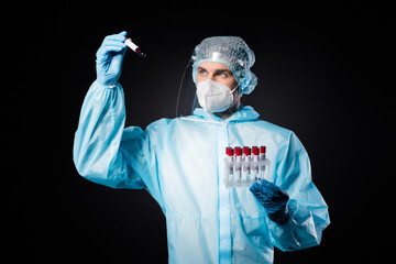 Photo of doc virologist hold blood probe tests covid vaccination research check one flask wear...