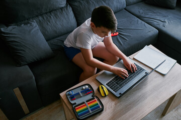 Child studying at home because of the coronavirus