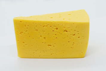 Cow's milk semi-hard cheese piece, slice of russian, sour creamy, gouda cheese isolated on white background.