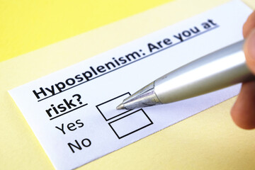 One person is answering question about hyposplenism.