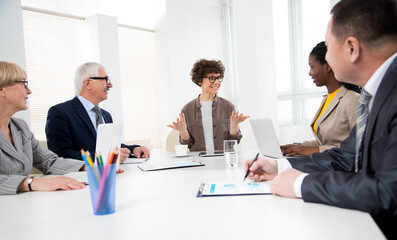 Multy-ethnic group of business people working at office