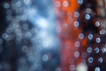 Fototapeta na wymiar Abstract bokeh blurred light, blue red and white colors.