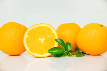 Orange fruit on white background . Healthy food. orange with green leaf on white background.