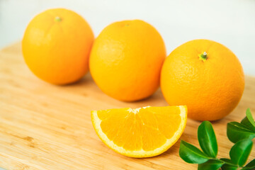Orange fruit on white background . Healthy food. orange with green leaf on white background.