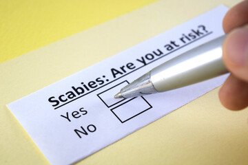 Obraz premium One person is answering question about scabies.