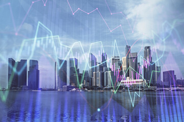 Forex chart on cityscape with tall buildings background multi exposure. Financial research concept.