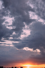 Naklejka na ściany i meble Sunset after the storm with a beautiful sky