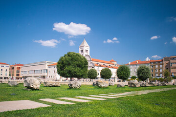 Ruins at the ancient Roman Forum in Zadar, Croatia. St. Mary's Church in the background