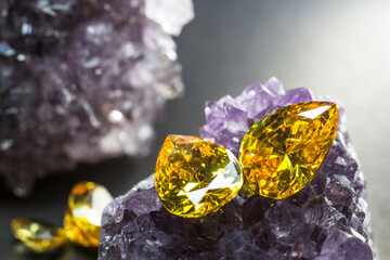 Natural yellow Sapphire gemstone, beautiful yellow gold citrin gemstone isolated on black...