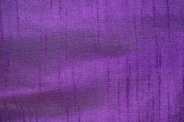 Fabric texture color purple for background.