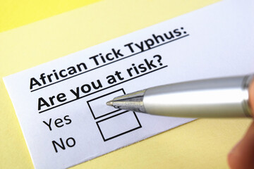 One person is answering question about african tick typhus.
