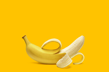 Peeled banana isolated on yellow background