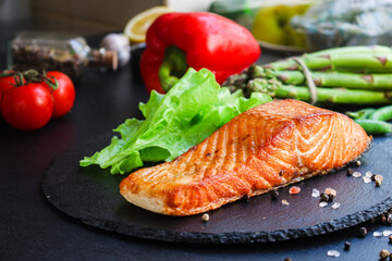 fried salmon barbecue grill Menu concept serving size. food background top view copy space for text keto or paleo pescatarian diet organic healthy eating