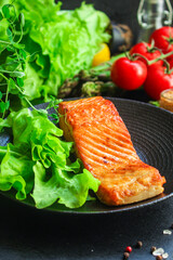 fried salmon barbecue grill Menu concept serving size. food background top view copy space for text keto or paleo pescatarian diet organic healthy eating
