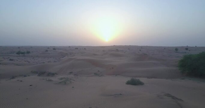 Sunset View Of Sand Dunes From The Ras Al Khaima Desert In UAE - aerial shot