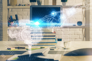 Double exposure of work space with computer and human brain drawing hologram. Brainstorm concept.