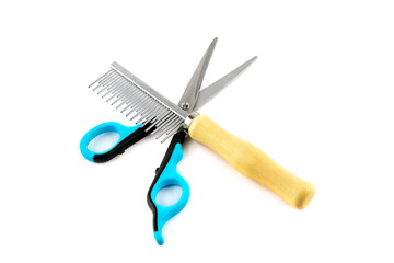 Scissors and stools for grooming dogs and cats isolated on a white .