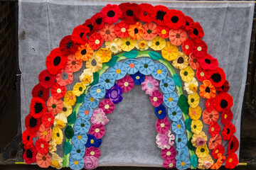 Rainbow made out of wool part of the vovid19 messages of hope