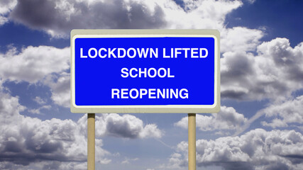 Education schools and Covid-19. Coronavirus Lockdown Lifted School Reopening sign with white clouds and blue sky. Back to work. Corona.