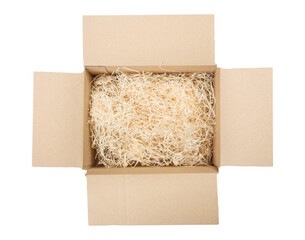 Top view of open cardboard box with shredded wood excelsior for filling inside. Using natural...