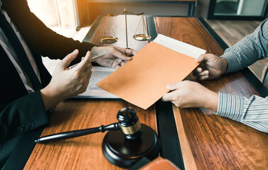 Client is submitting information on the paper of the prosecution document to the lawyer.