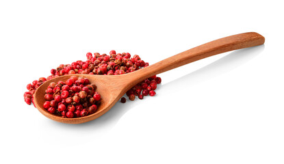 Red peppercorn in wood spoon isolated on white background