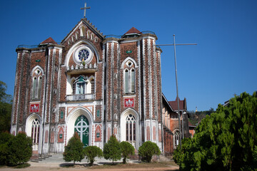 Facade of a catholic church. Colonial European heritage. Christian religion in Asia. Village of...