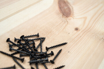 Screws for wooden boards. Carpentry workshop