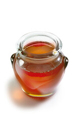  miel dulce  en tarro de cristal sobre fondo blanco.  sweet honey in glass jar on white background.