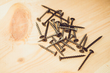 Screws for wooden boards. Carpentry workshop