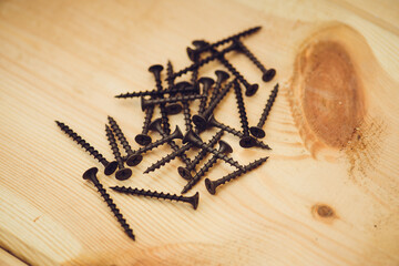 Screws for wooden boards. Carpentry workshop