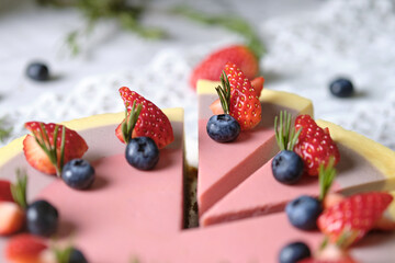 Low Fat Mousse Yogurt Strawberry and Raspberry Cheesecake set on cafe table.  Gluten Free Low-Carb Healthy Dessert.