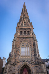 Fototapeta na wymiar Tower of Buccleuch and Greyfriars Free Church in Edinburgh city, UK