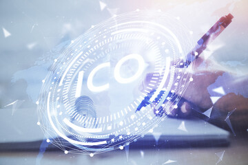 Cryptocurrency hologram over hands taking notes background. Concept of blockchain. Multi exposure