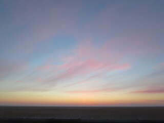 Fototapeta na wymiar watercolor clouds at sunrise