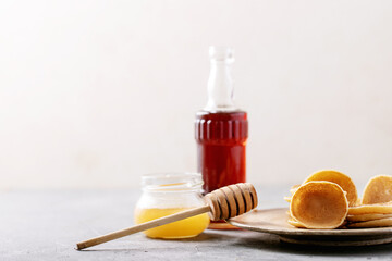 A stack of plain mini pancakes