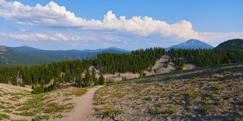 Panoramic landscape with the trail on the plateau near South Sister mountain in Central Oregon.