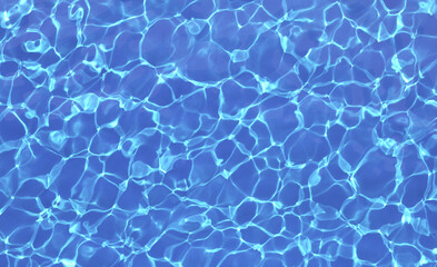 Blue water in swimming pool with sun reflections. Top view