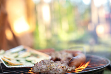 Delicious meat and vegetables on a barbecue grill.