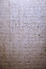 Ancient inscriptions on stone, close-up.