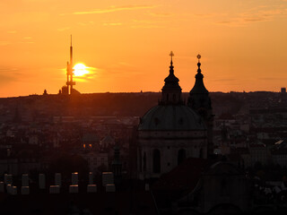 Fototapeta na wymiar Dawn over Prague. The urban skyline of an ancient European city at dusk.