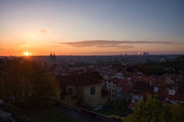 Fototapeta premium Dawn over Prague. The urban skyline of an ancient European city at dusk.