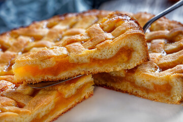 slices of apricot shortcrust pie, top view