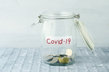 Money jar with covid19 label