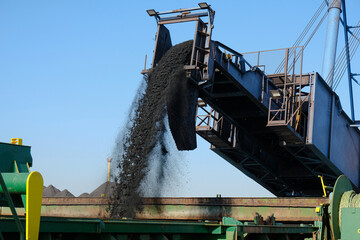 loading of iron ore concentrate into the ship's hold