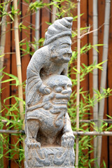 Obraz premium Ancient Chinese figures and lion stone sculptures