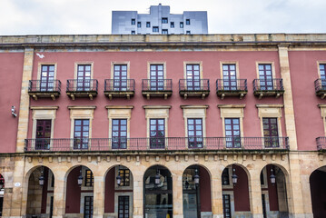 Fototapeta na wymiar Facade of building on Main Square of historic part of Gijon city in northwestern Spain