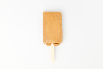 Caramel ice cream on white background